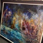 Custom framed art displayed in a professionally designed room